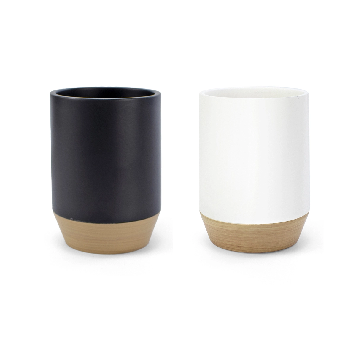 vaso blanco y vaso negro para cepillos de dientes