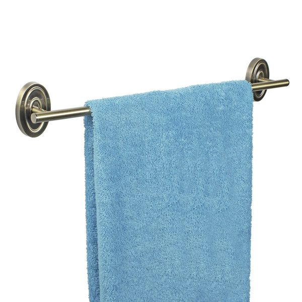 detalle toallero adhesivo baño oro viejo