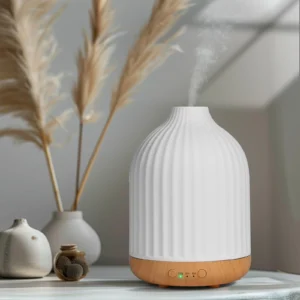 Difusor de aceites esenciales de cerámica blanca con base de madera, diseño decorativo moderno y función de temporizador