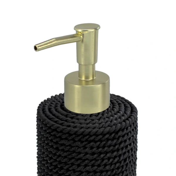 Detalle de la válvula oro cepillado del dispensador de jabón Trenzo negro con textura trenzada